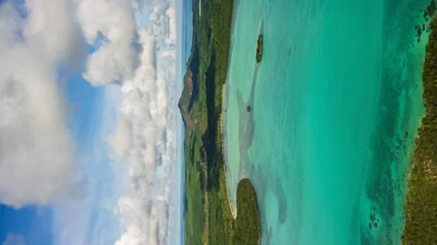 Vertical aerial hyperlapse flying towards paradisiacal Isle of Pines and Stock Footage 267839033