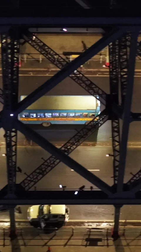 Vertical Aerial Night View of Howrah Bridge and Ferry Kolkata India Stock Footage 330719254