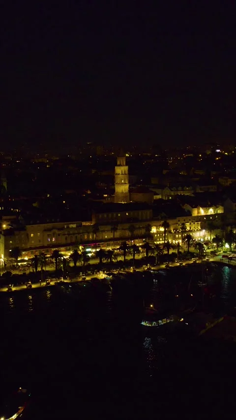 Vertical Aerial Night View of Split, Croatia with Cathedral in Background Stock Footage 316743339