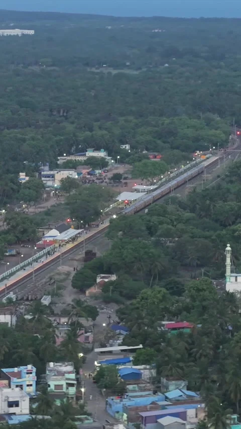 Vertical Aerial Night View of Train Crossing Pamban Bridge Tamil Nadu Stock-Footage 335682825