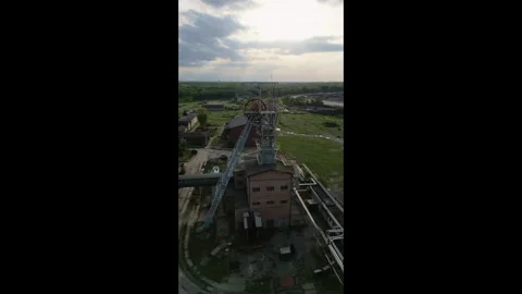 Vertical aerial orbit of a historical coal mine shaft in Poland. Stock-Footage 342436366