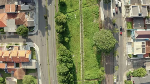 Vertical Aerial of a Railway Corridor Between City Streets Stock Footage 340300664