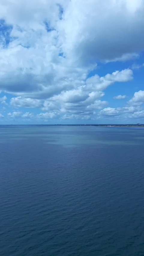 Vertical Aerial Shot of Flight Over Corpus Christi Bay Toward Open Gulf Waters Stock Footage 336473803