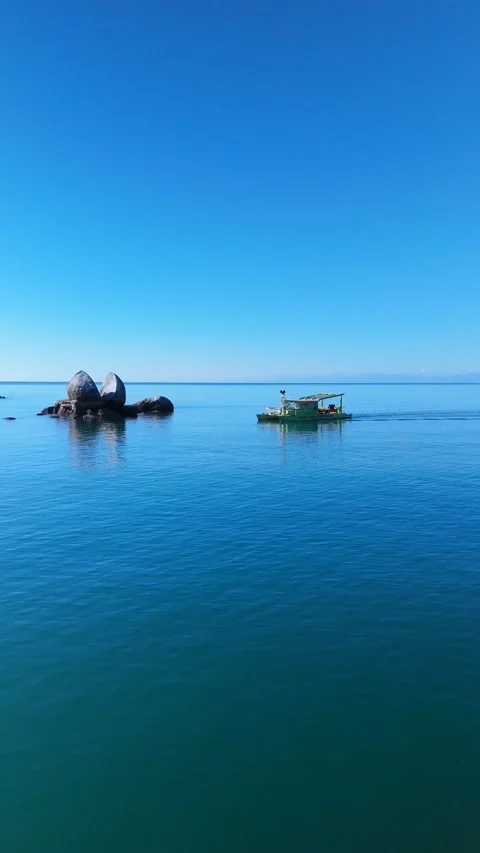 Vertical Aerial of Split Apple Rock and Mussel Farm Stock-Footage 334000474