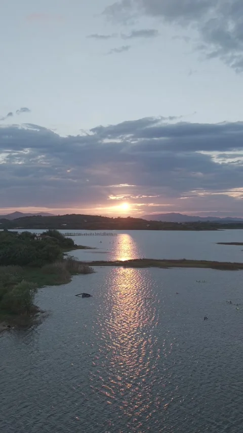 Vertical Aerial Sunset Lake Reflection with Boats Stock-Footage 345031527