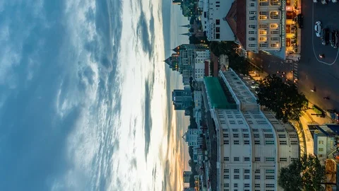 VERTICAL aerial time lapse of Saigon District One at Sunset. Stock Footage 115958736