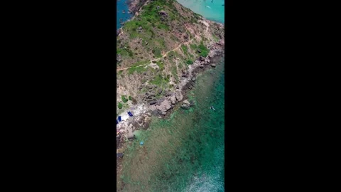 Vertical Aerial Top-Down View of Rugged Eo Gio Cliffs and Turquoise Sea Stock Footage 322344956