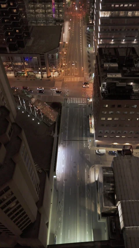 Vertical aerial top-down view of Toronto downtown intersection at night Stock-Footage 333889315