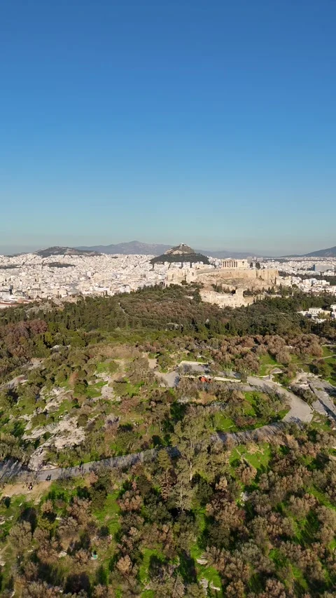 Vertical Aerial view of the Acropolis and ancient theater in Athens Video stock 297965825