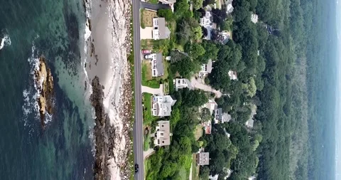 Vertical aerial view of beachside homes on New Hampshire seacoast Stock-Footage 329214030