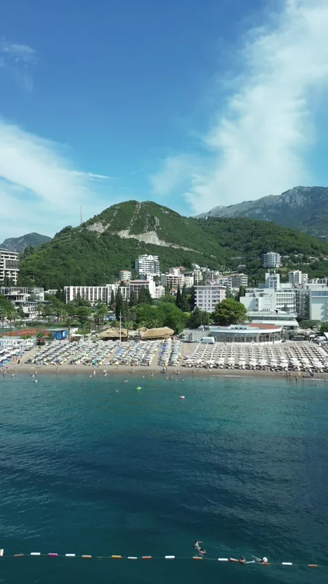 Vertical aerial view of Becici Beach in Montenegro Stock Footage 338026575
