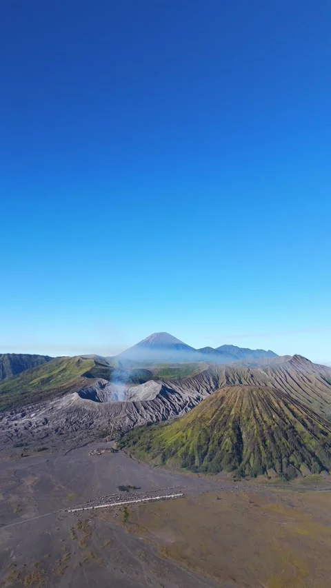 Vertical aerial view of Bromo, Tengger and Semeru volcanoes in East Java Video stock 317755231