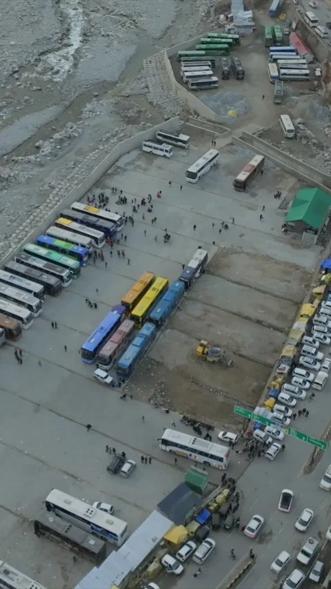 Vertical Aerial View of Bus Parking Area in Manali Himachal Pradesh India Stock Footage 335115622