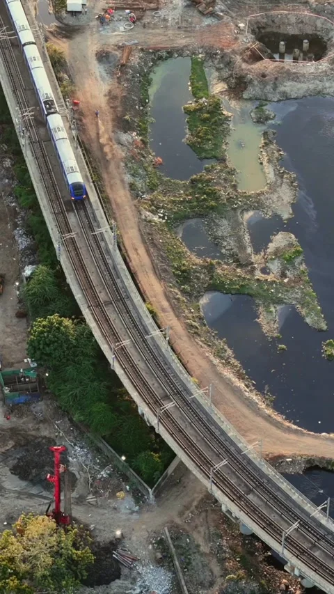 Vertical Aerial View of Chennai Metro Train and Cityscape India Stock Footage 336843598