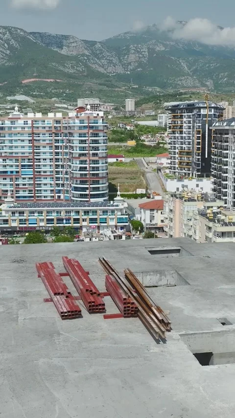 Vertical aerial view of construction site between completed residential Stock Footage 341786990