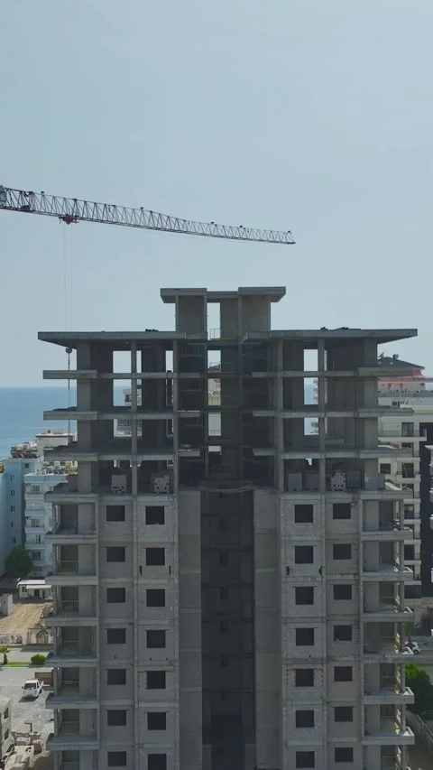 Vertical aerial view of construction site with equipment and materials Stock Footage 341788489