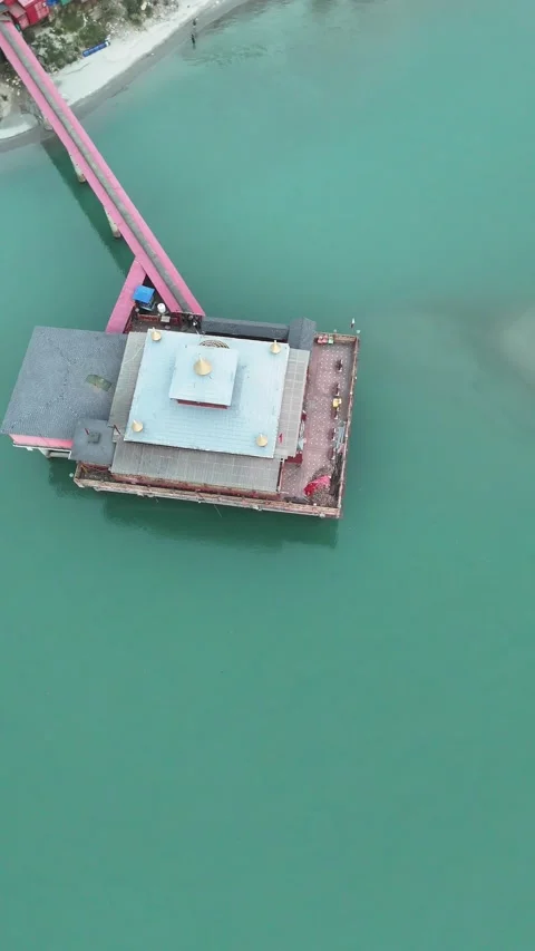 Vertical Aerial View of Dhari Devi Temple on Alaknanda River Uttarakhand Video stock 335010273