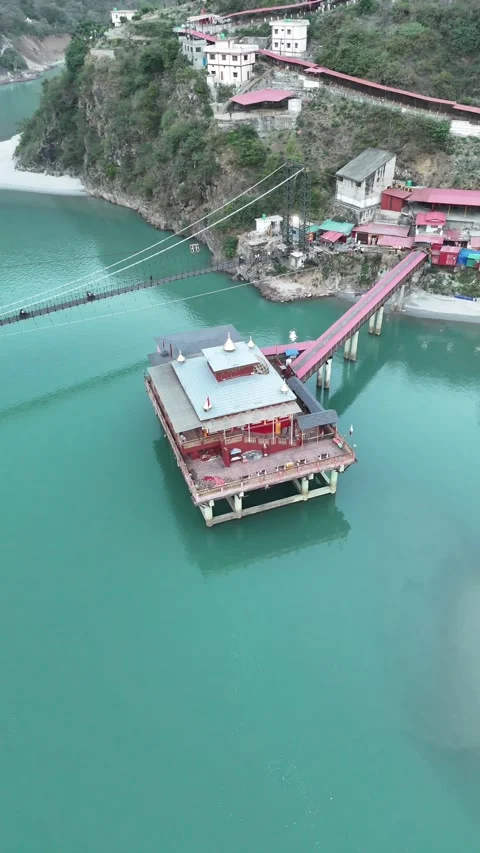 Vertical Aerial View of Dhari Devi Temple on Alaknanda River Uttarakhand Video stock 335010347