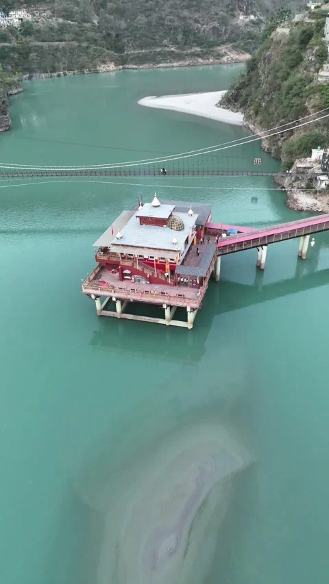 Vertical Aerial View of Dhari Devi Temple on Alaknanda River Uttarakhand Видео 335010349