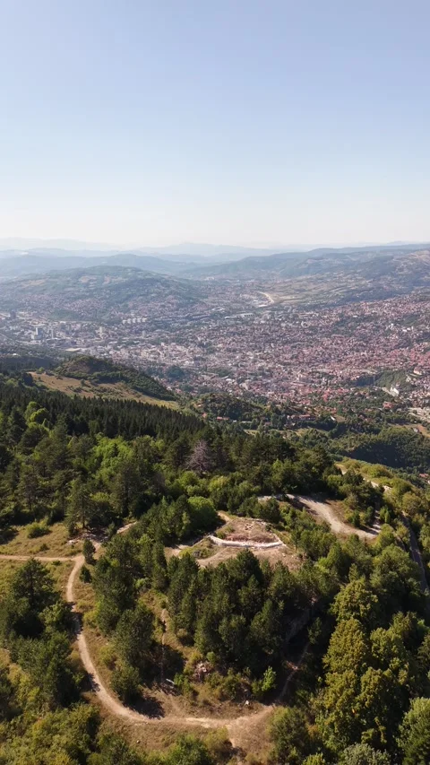Vertical Aerial View of Drone Flyover Over Trebevic Slopes Towards Sarajevo  Vídeo Stock 342715529