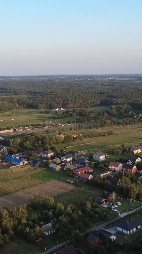 Vertical Aerial View of Flat Farmland Fields and Scattered Country Houses Stock Footage 344851185