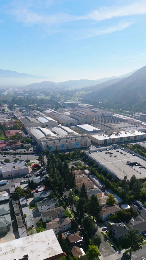 Vertical Aerial View Flying Forward Over Warner Bros. Studios in Burbank, March Stock Footage 305449505