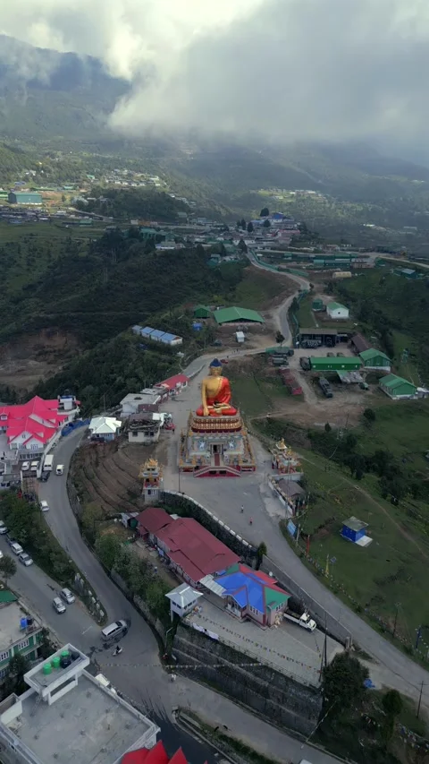 Vertical Aerial View of Giant Buddha Statue at Buddha Point, Tawang 動画素材 339645771