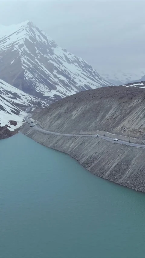 Vertical Aerial View of High Altitude Lake and Mountain Road in Ladakh Video stock 342602214
