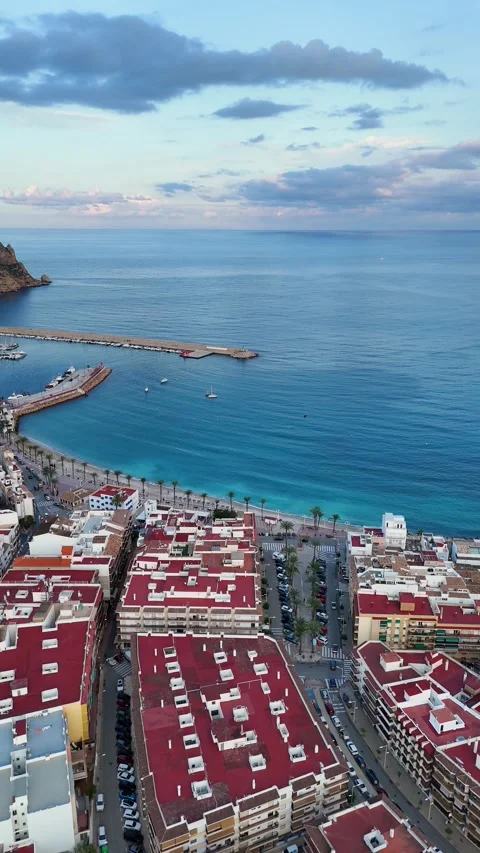 Vertical aerial view of Javea old town rooftops and marina, Spain Stock Footage 339892601