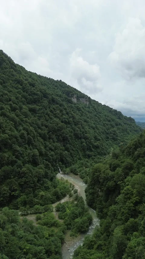 Vertical Aerial View of Kaghu Waterfall Joining Abasha River, Georgia Stock Footage 341834975