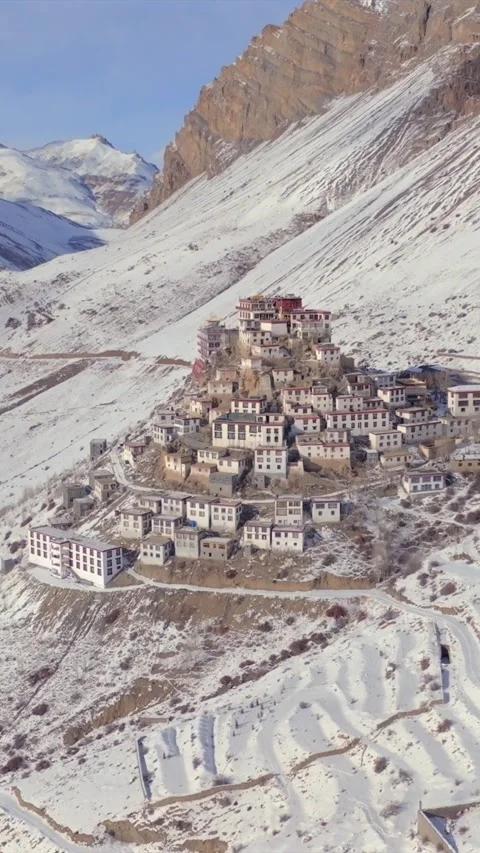 Vertical Aerial View of Key Monastery in Snow Covered Spiti Valley Stock Footage 335115437