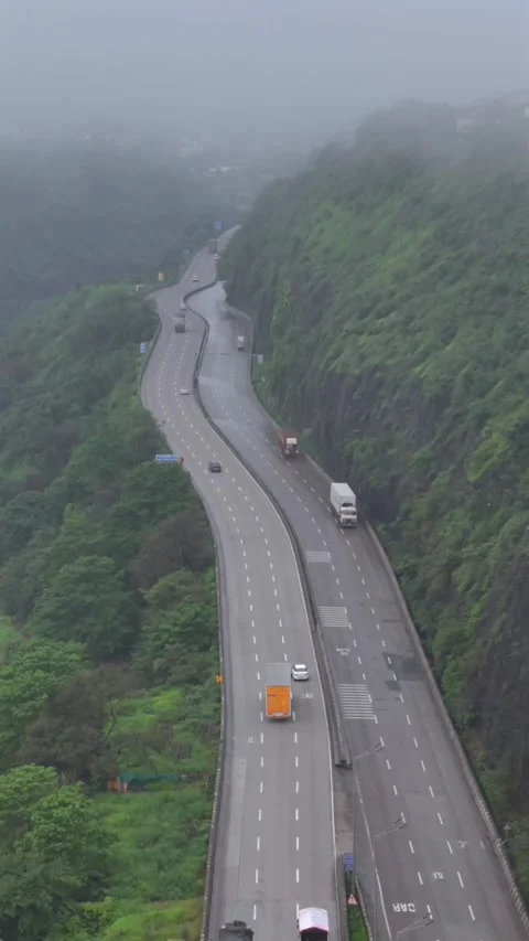 Vertical Aerial View of Lonavala Hill Road in Monsoon Pune Stock Footage 344536756