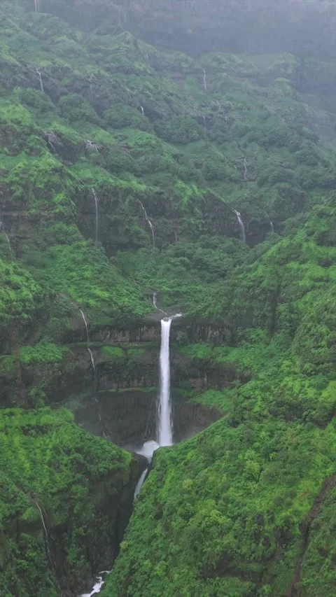 Vertical Aerial View of Marleshwar Dhareshwar Waterfall Ratnagiri Maharashtra Stock Footage 345211564