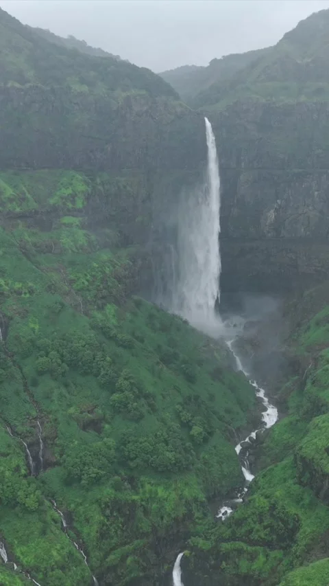 Vertical Aerial View of Marleshwar Dhareshwar Waterfall Ratnagiri Maharashtra Stock Footage 345211839