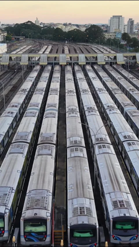 Vertical Aerial View of Metro Trains Parked at Railway Depot Vídeo Stock 340535902