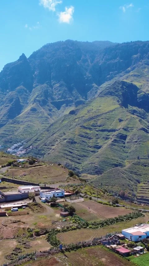 Vertical Aerial View of a Mountain Valley and Terraced Farmland in Gran Canaria Stock Footage 344851070