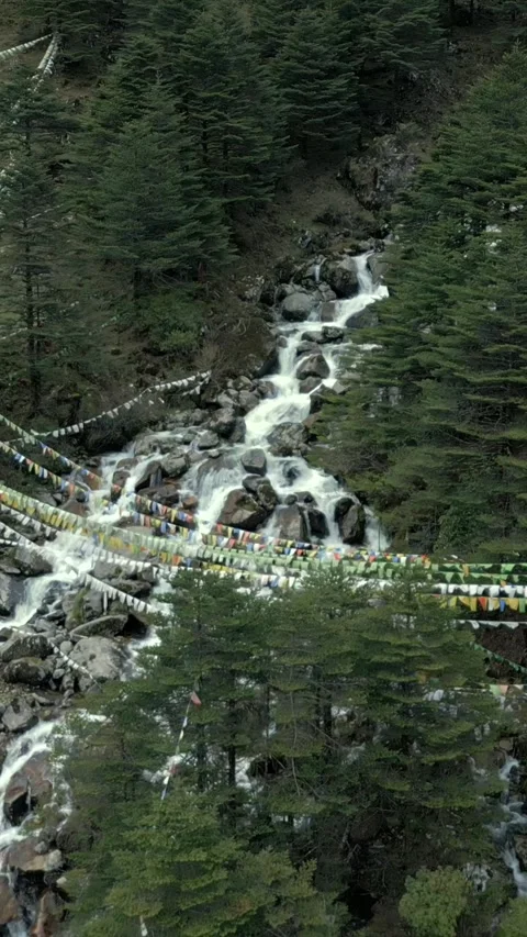 Vertical Aerial View of Mountain Waterfall in Tawang Stockbeeldmateriaal 339884536