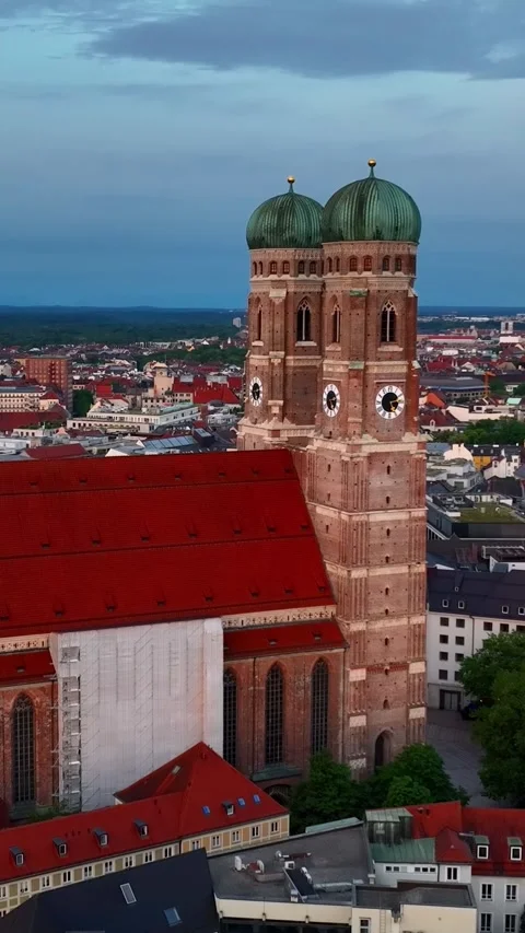 Vertical aerial view of Munich old town, Frauenkirche in Munich at sunrise Stock Footage 278680586