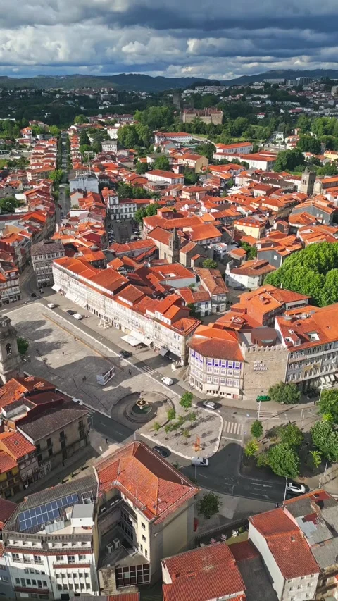 Vertical Aerial View Over Historic European City With Red Tile Rooftops Stock Footage 334945699