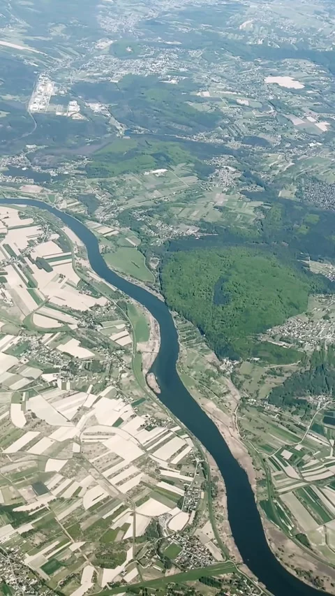 Vertical aerial view over Kraków, Poland, showing the Vistula River, forested Video stock 336938141