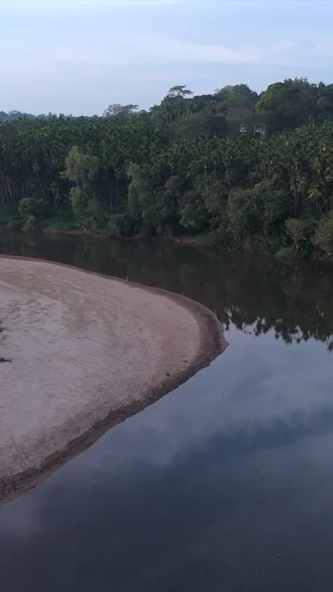 Vertical Aerial View of River and Forested Hills Near Pune Maharashtra Stock Footage 346755388