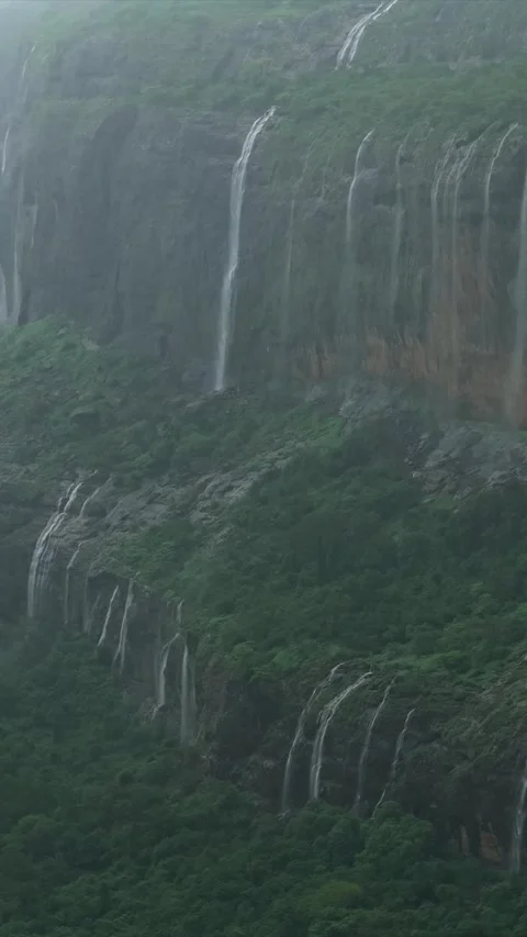 Vertical Aerial View of Savlya Ghat Waterfalls and Sahyadri Mountains Stock Footage 345646176