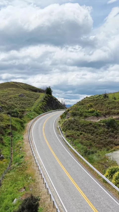 Vertical Aerial View of Scenic Road Near Lake Wanaka in New Zealand Stock Footage 336845537