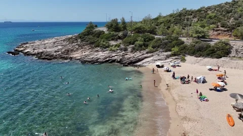Vertical aerial view of a secluded beach and clear blue water in Greece. Stock Footage 327677568