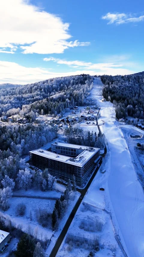 Vertical Aerial View of Ski Slope and Hotel in Winter Krynica Zdroj Poland Stock Footage 333475099