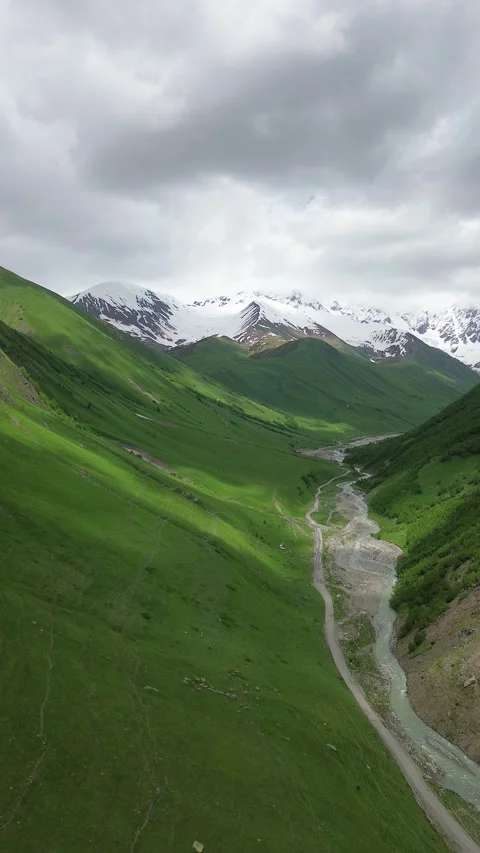 Vertical Aerial View, Snow-Capped Mount Shkhara, Georgia Stock Footage 339347856