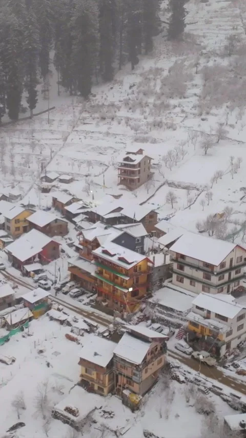 Vertical Aerial View of Snow Covered Village in Manali Himachal Pradesh Stock Footage 335115704