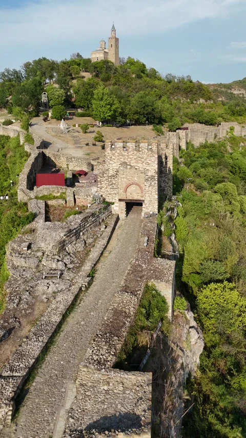 Vertical aerial view of the stone path leading to the Tsarevets gate. Stock Footage 327676884