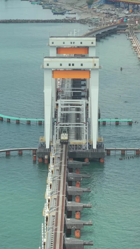 Vertical Aerial View of Train Crossing Pamban Bridge Tamil Nadu India Stock Footage 335682953