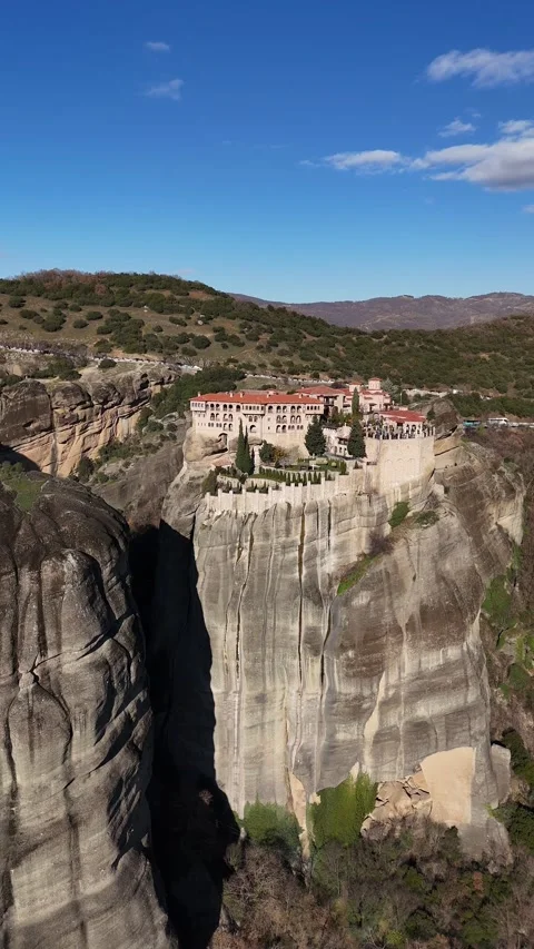 Vertical Aerial view of Varlaam Monastery in Meteora region. UNESCO World Herita Video stock 298281865